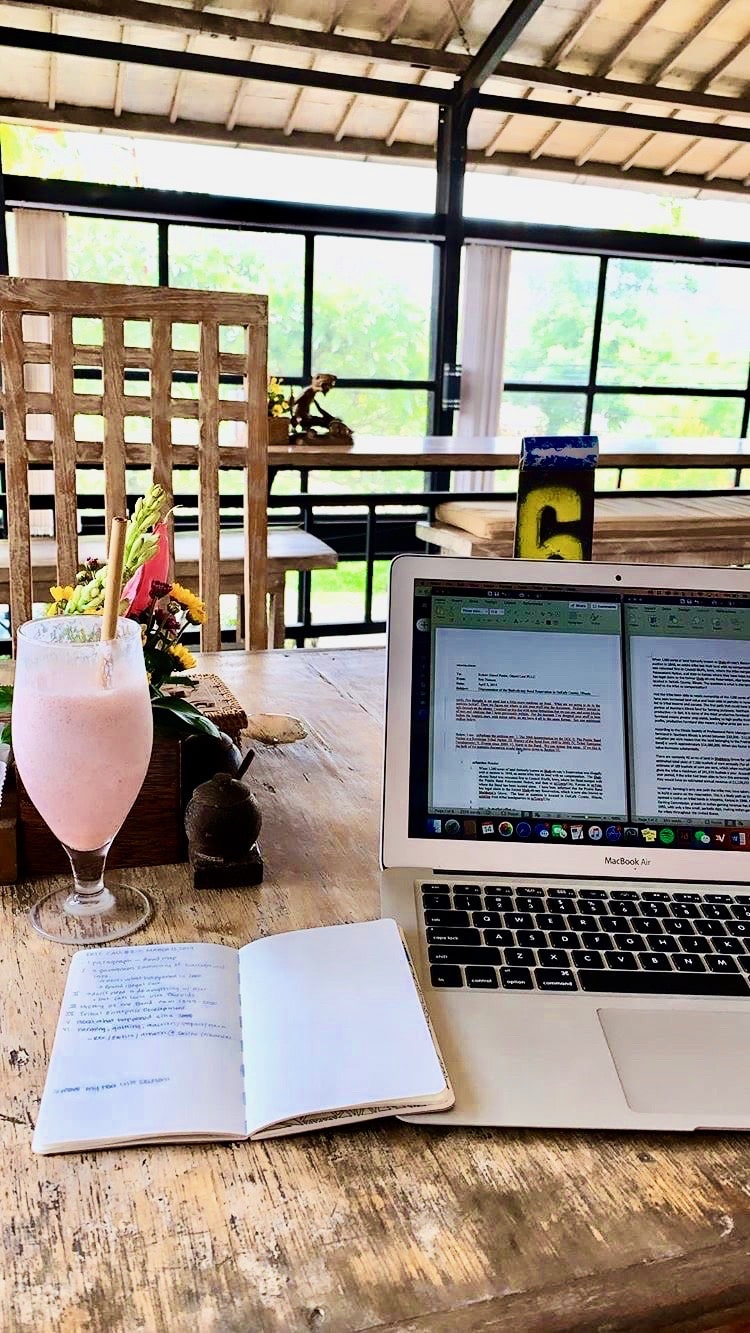 remote work at a beautiful location with a smoothie